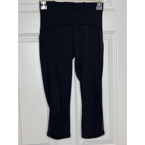 Lululemon Train Times Size 4 Black Crop with Mesh leggings - Picture 2 of 9